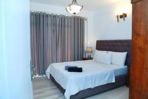 Ajymth Luxury Apartments - Lakeview Residencies - F24