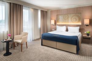 Standard Double or Twin Room with Balcony and Mountain View room in Landmark Creek Hotel & Wellness