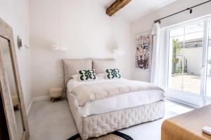 Appart'hotels Secret d-Uzes - Place aux Herbes - Piscine chauffee et Jacuzzi : photos des chambres