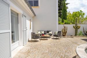 Appart'hotels Secret d-Uzes - Place aux Herbes - Piscine chauffee et Jacuzzi : photos des chambres