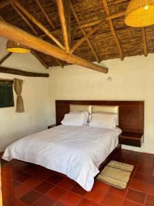 Bella casita de adobe vía a la laguna de Tota