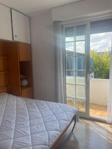 Appartements Studio lumineux au calme en centre ville, face aux thermes : photos des chambres