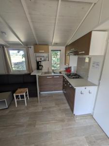 Campings Mobil home 4x8m et terrasse 18m2 : photos des chambres