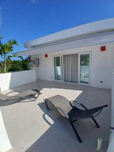 En Plaza Center Penthouse con 3 terrazas en el centro de Las Terrenas la playa està a 5 min a pied