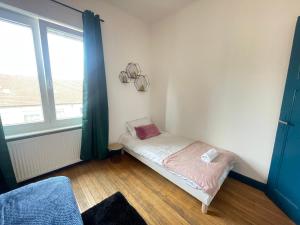 Appartements L-Avenue 6 Lits Wifi Parking Un Sejour a Part : photos des chambres