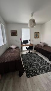 Upea ja hyvin varusteltu paritalohuoneisto lähellä merenrantaa