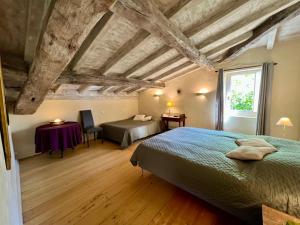 Maisons de vacances Gite la Maison du Queyran : photos des chambres