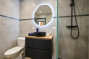 Appartements Le Cabrit - Climatisation - Wifi : photos des chambres