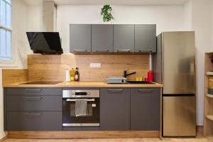 Appartements Le Cabrit - Climatisation - Wifi : photos des chambres