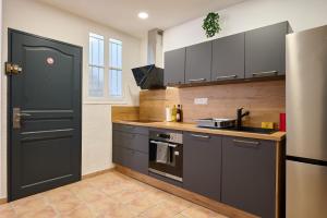 Appartements Le Cabrit - Climatisation - Wifi : photos des chambres