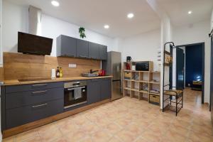 Appartements Le Cabrit - Climatisation - Wifi : photos des chambres