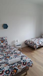 Appartements Appartement Miami pres de Douai : photos des chambres