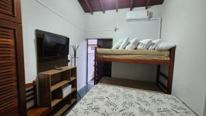 Casa em Condomínio Toninhas duas vagas de garagem