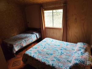 Pucura, cabaña entre laureles