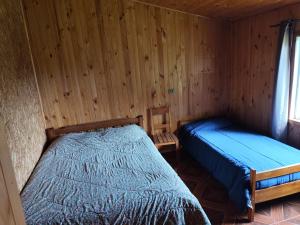 Pucura, cabaña entre laureles