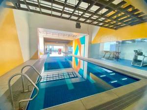 Native themed Condo Staycation in QC