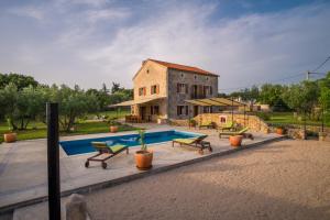 Villa with pool, olive garden and sea view by TRAVELER tourist agency Krk - ID 2147