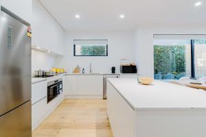 Stylish 4BR Family Townhouse with Private Courtyard