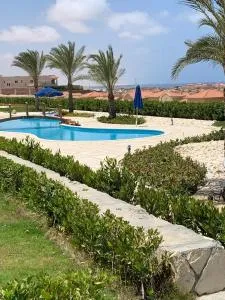 Nice Chalet with garden in Lavisat Bay, north Coast, Egypt - Aḑ Ḑab‘ah