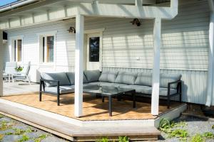 Villa Nurmenhelmi järven rannalla