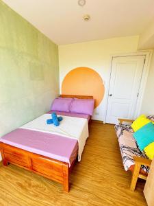 2 Bedroom Summer Themed Unit at Azure