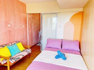 2 Bedroom Summer Themed Unit at Azure