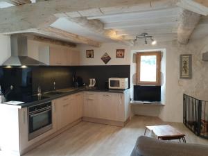 Maisons de vacances Maison en pierre de hameau : photos des chambres