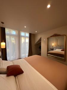 Appartements Eden Room - Luxe, Balneo & Sauna : photos des chambres
