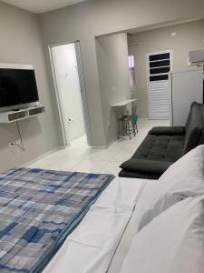 AP Perto do Aeroporto com Ar C, simples e confortável