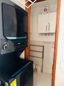 exclusivo edificio con piscina en primera linea de playa