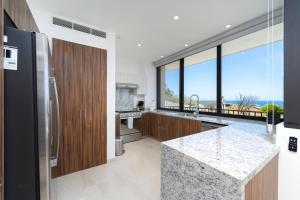 Private and heated POOL with ARCH VIEW new condo!