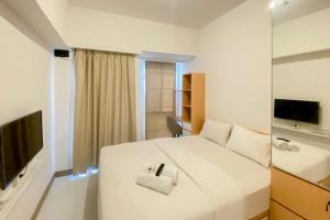 Simple and Cozy Stay Studio Tokyo Riverside PIK 2 Apartment By Travelio