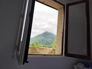 Appartements Ossau T2 5 personnes tt confort climatisation piscine linge de maison inclus moustiquaires vue montagne plein sud : photos des chambres