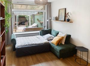 Central located apartment - groundfloor & garden