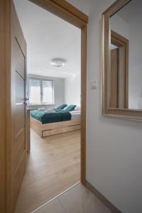 Krynica Apartamenty - Apartament z sypialnią - Źródlana