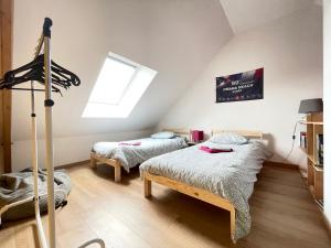 Maisons de vacances Sweet Omaha Belle maison recente lumineuse et cosy bien equipee jardin clos 15 mn a pied plage Omaha Beach et proche de Bayeux & Port en Bessin : photos des chambres