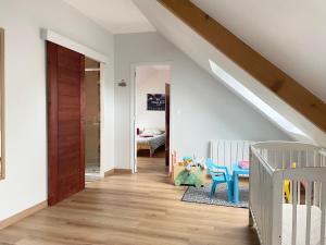 Maisons de vacances Sweet Omaha Belle maison recente lumineuse et cosy bien equipee jardin clos 15 mn a pied plage Omaha Beach et proche de Bayeux & Port en Bessin : photos des chambres