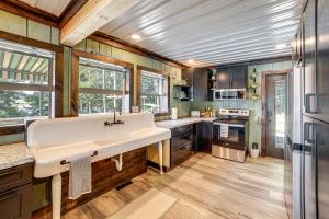 Private Island Home in Belding with Dock and Grill!