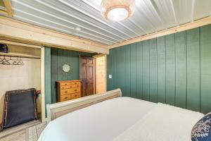 Private Island Home in Belding with Dock and Grill!