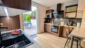 Maisons de vacances Le Cemarose: spa, jardin, terrasse et jolie vue au coeur d'Epernay : photos des chambres