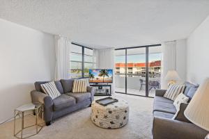 Condo overlooking Clam Bay with pool and beach access
