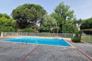 Appartements Joli T2 vue sur le jardin proche de Toulouse : photos des chambres