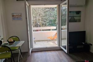 Appartements Joli T2 vue sur le jardin proche de Toulouse : photos des chambres