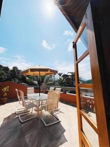 Casa com piscina vista mar