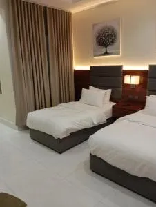 الدار للشقق المؤثثة غرفه 2سرير - Al ‘Arīn