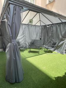 Appartements Charmant appartement avec terrasse et parking - Centre ville : photos des chambres