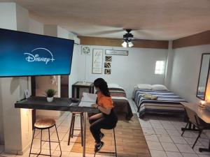 Habitacion tipo hotel centrico 3 camas, cocina,WIFI E