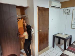 Habitacion tipo hotel centrico 3 camas, cocina,WIFI E