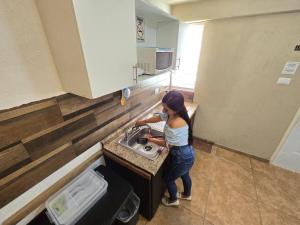 Departamento CENTRICO, Tv smart, minisplit nuevo, wifi 100 mb, cocina, lavadora, asador, parking, letra i