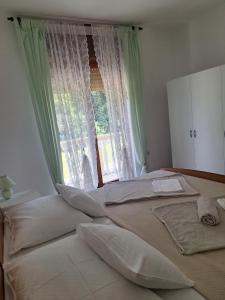 Apartments and rooms with parking space Palit, Rab - 22221